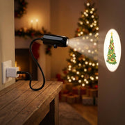 USB Christmas projector plugged into a wall socket, projecting a Christmas tree in a cozy living room