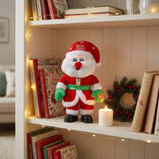 Singing and Talking Christmas Plush Toy - Lifestyle: Santa on a bookshelf