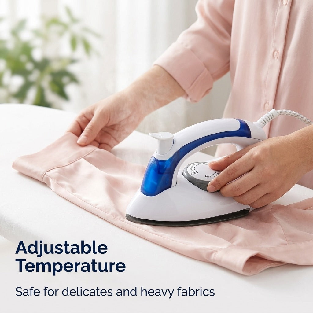 Adjusting the temperature dial to iron a delicate blouse